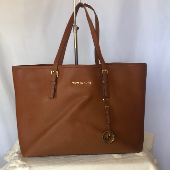 Michael Kors Handbags - MICHAEL KORS brown saffiano leather large jet set travel tote.